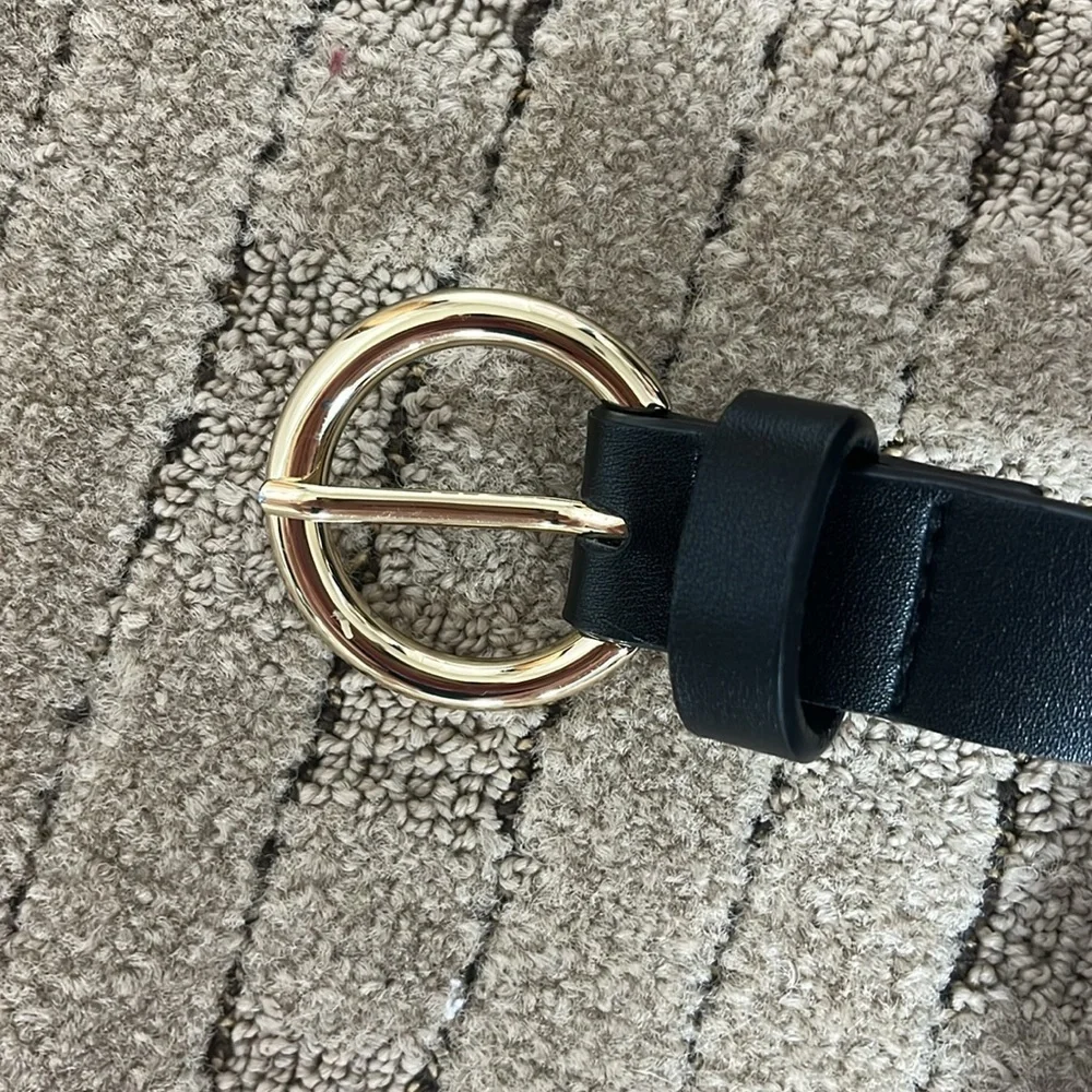 Gold circle black belt